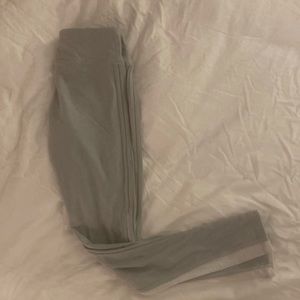 Gottex grey legging with white mesh detail on side calf